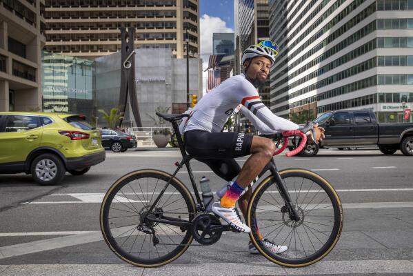 He started cycling during pandemic now leads rides models AP News
